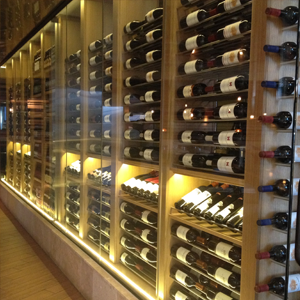 Wooden racking and a glass front for elegant wine wall