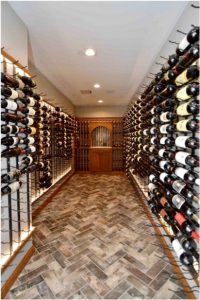 Metal wine racks in a contemporary residential wine cellar
