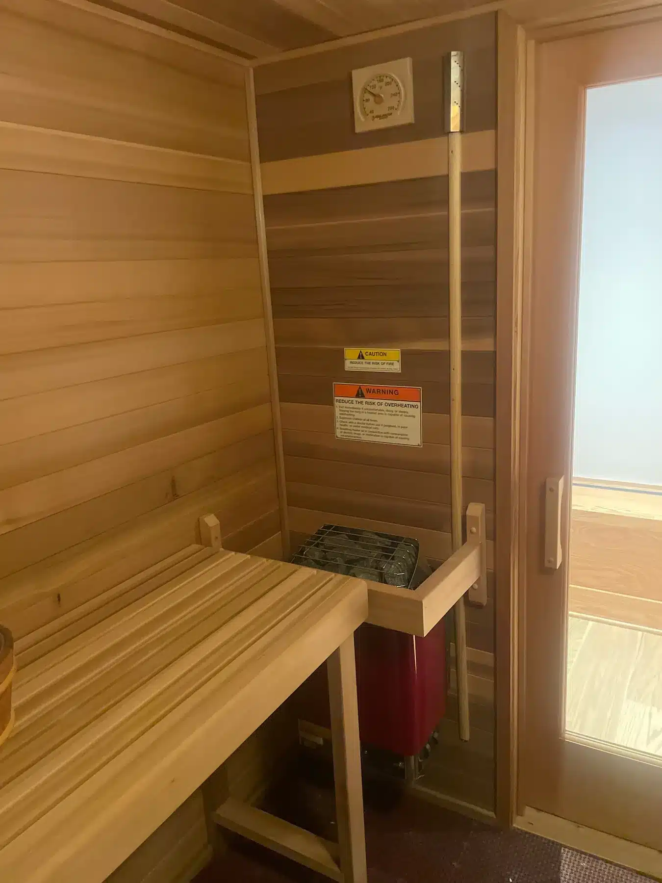 Finished Western Red Cedar sauna interior with 6 kW Harvia heater