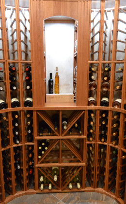 Custom wooden racking is a beautiful and effective choice for this gorgeous custom residential cellar.