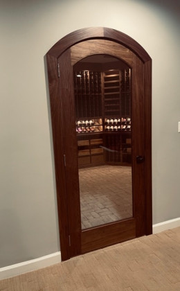 The right wine cellar door will not only look beautiful, it will securely protect the valuable collection inside.