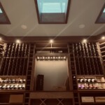LED lighting combined with skylights are a beautiful way to add light to this amazing residential wine cellar.