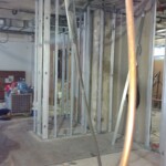 The Harvest team works with precision when building custom wine cellars.