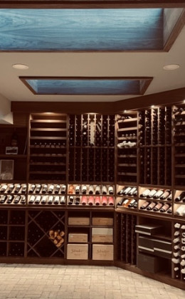 Gorgeous skylights allow for more light in the custom wine cellar.