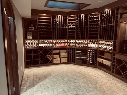 This cellar features multiple styles of racking, allowing for a large capacity and beautiful displays.