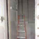 Door framing for custom wine cellar at Wolfgang Puck's CUT restaurant.