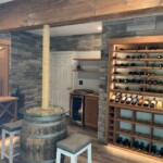We will match your custom wine cellar to your style preferences. This homeowner chose gorgeous slate walls that look incredible with the wooden racks.
