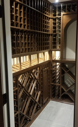 LED lights showcase this reveal row, designed for displaying your favorite bottles.