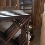 Wood racks are available in a variety of stains. A dark finish like this looks great set against lighter colored walls and floors.