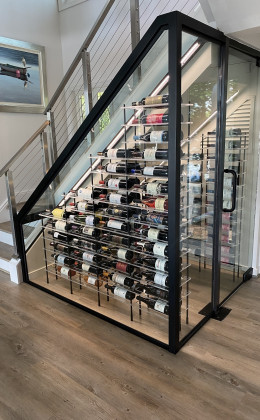 This stunning contemporary wine cellar is a beautiful conversation starter and a wonderful centerpiece for this home.