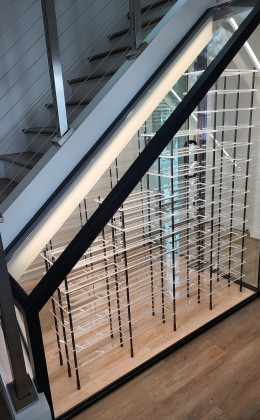 Acrylic shelving make for a very unique way to display and protect wine.