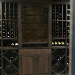 Harvest created this decorative arch as a centerpiece and visual focal point in this traditional wine cellar.