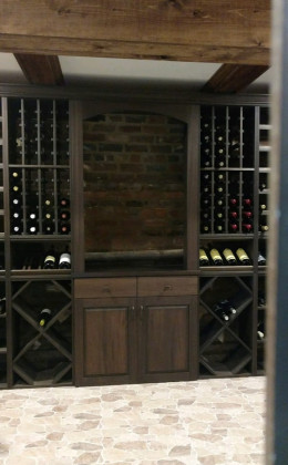 Harvest created this decorative arch as a centerpiece and visual focal point in this traditional wine cellar.