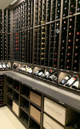 Cork forward Sapele Mahogany racking is a very effective way to store lots of wine bottles in this beautiful home wine cellar.