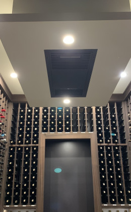 This Whisperkool Ceiling Mount 8000 series does a fantastic job cooling this home wine cellar.