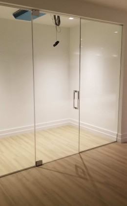 Frameless glass wine doors require adjustments to the heat load calculation.