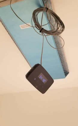 This modern glass wine cellar features a dependable and powerful Wine Guardian cooling system.